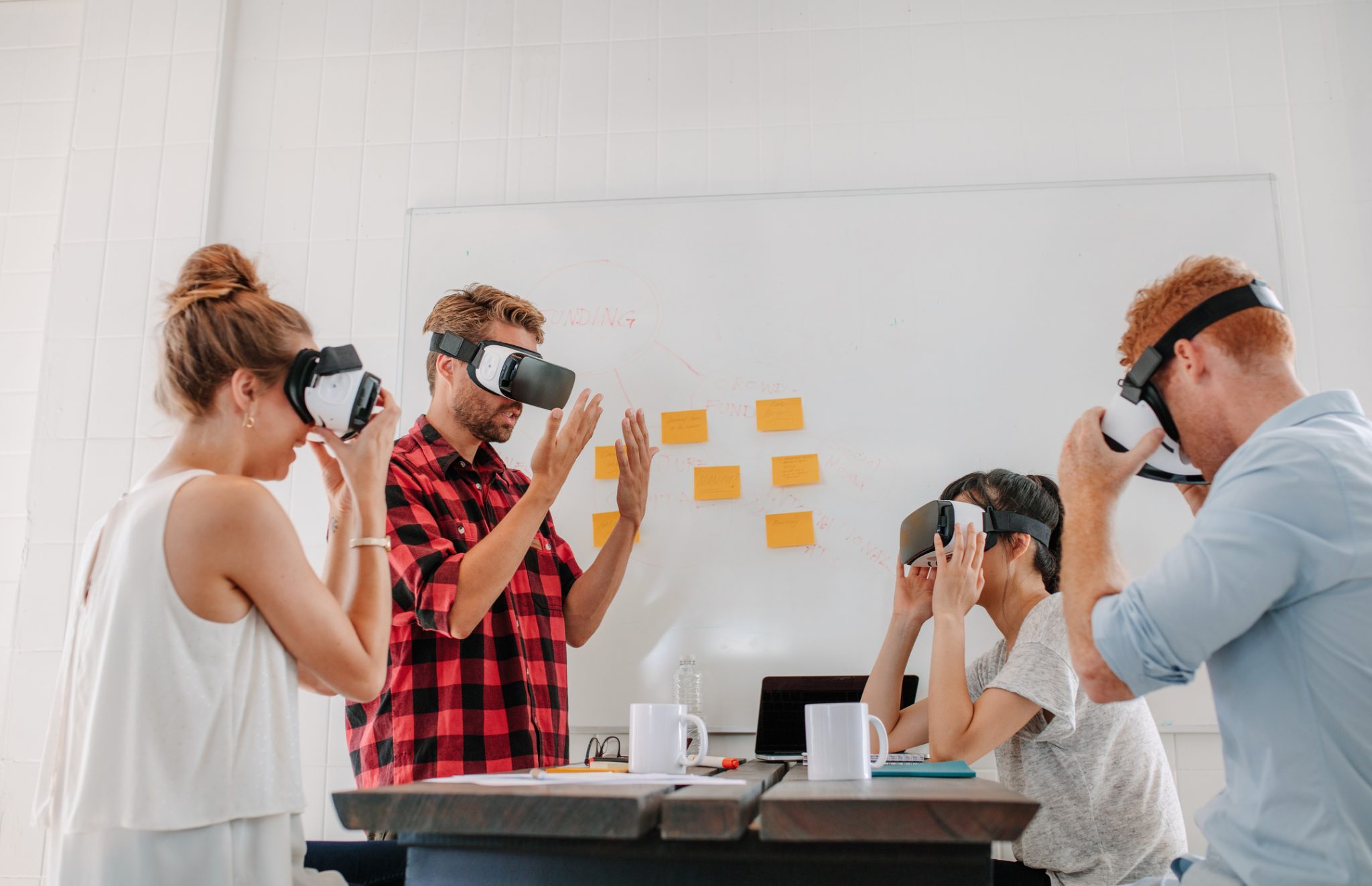 team-developers-testing-virtual-reality-headset
